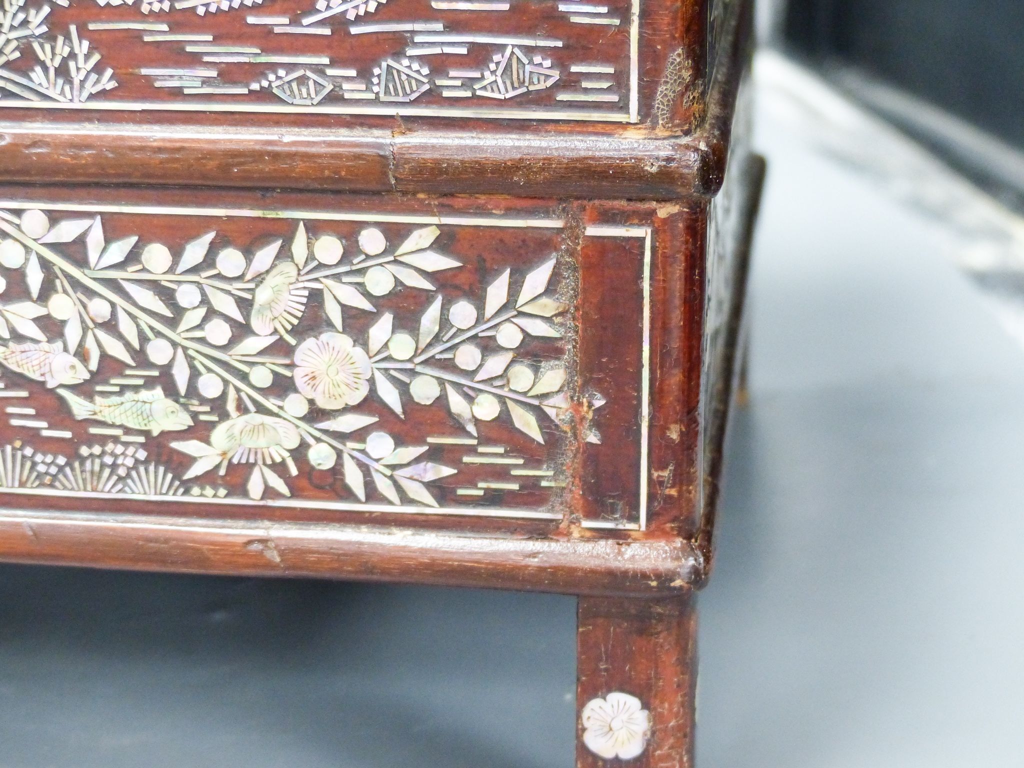 A 19th century Korean lacquered wood stove with mother of pearl inlay 38cm